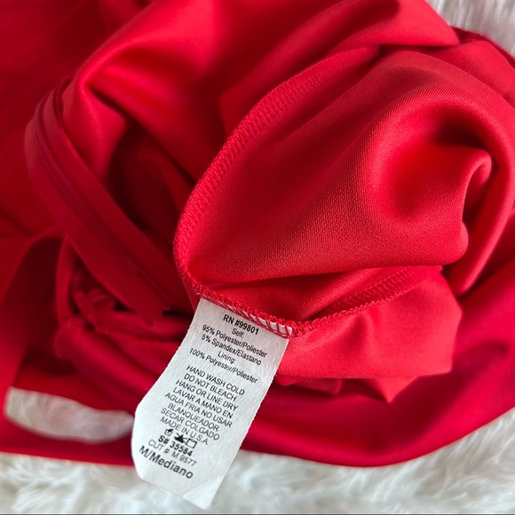 NWOT Red Overlay Asymmetrical Skirt O-Ring Romper - Picture 8 of 9